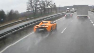 <p>A Polish driver was brought back down to earth after being filmed spinning out and crashing his super car after accelerating in wet weather.</p>
<p>
The footage, uploaded to YouTube last Friday, shows the driver of the orange McLaren 650S cruising along the main motorway between Krakow and Warsaw when he decided to floor it. </p>
<p>
But the drizzly conditions caused the man to lose control of his car, a model that sells for just under $450,000, and hitting a road divider and spinning out six times before coming to a halt. </p>
<p>
It is not known whether the man suffered any injuries or whether it was just his flashy car that was left battered by the costly episode. </p>
<p>
Check out this gallery for more instances of supercar drivers coming unstuck on the road.</p>
<p>
</p>