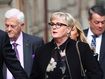 Former Minister Linda Reynolds arrives at the Supreme Court in Perth for the defamation trial, with husband Robert Reid 