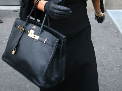 Victoria Beckham carrying her Birkin bag in Milan, 2009