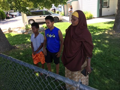 Fathi Mahamoud (left), 11, Esrom Habte, 12, and Thado Aip describe the attack that left nine fellow residents of their Boise, Idaho, apartment complex with stabbing injuries. Picture: AP