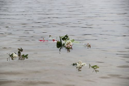 The infant's body drifted 30km on currents before washing up on Monday morning on Surfers Paradise beach.