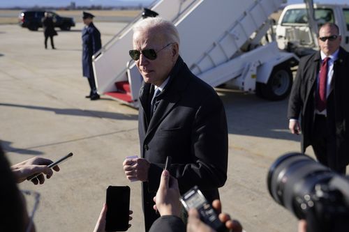 President Joe Biden speaks with members of the press after stepping off Air Force One at Hagerstown Regional Airport in Hagerstown, Md., Saturday, Feb. 4, 2023, en route to Camp David for the weekend. 