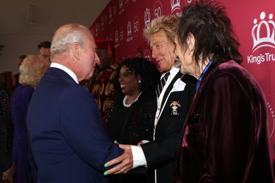 LONDON, ENGLAND - MAY 11: Britain's King Charles III speaks with British rock legends Rod Stewart and Ronnie Wood as he arrives to attend 'A King's Trust 50th Anniversary Celebration' at the Royal Albert Hall on May 11, 2026 in London, England. (Photo by Adrian Dennis – WPA Pool/Getty Images)