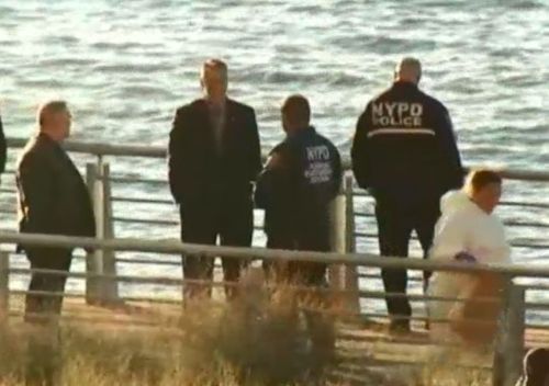 Police at the bank of the Hudson River last week close to where the bodies of the sisters were found. (NYPD).