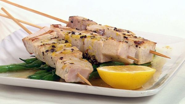 Lemon and pepper swordfish skewers with garlic green beans
