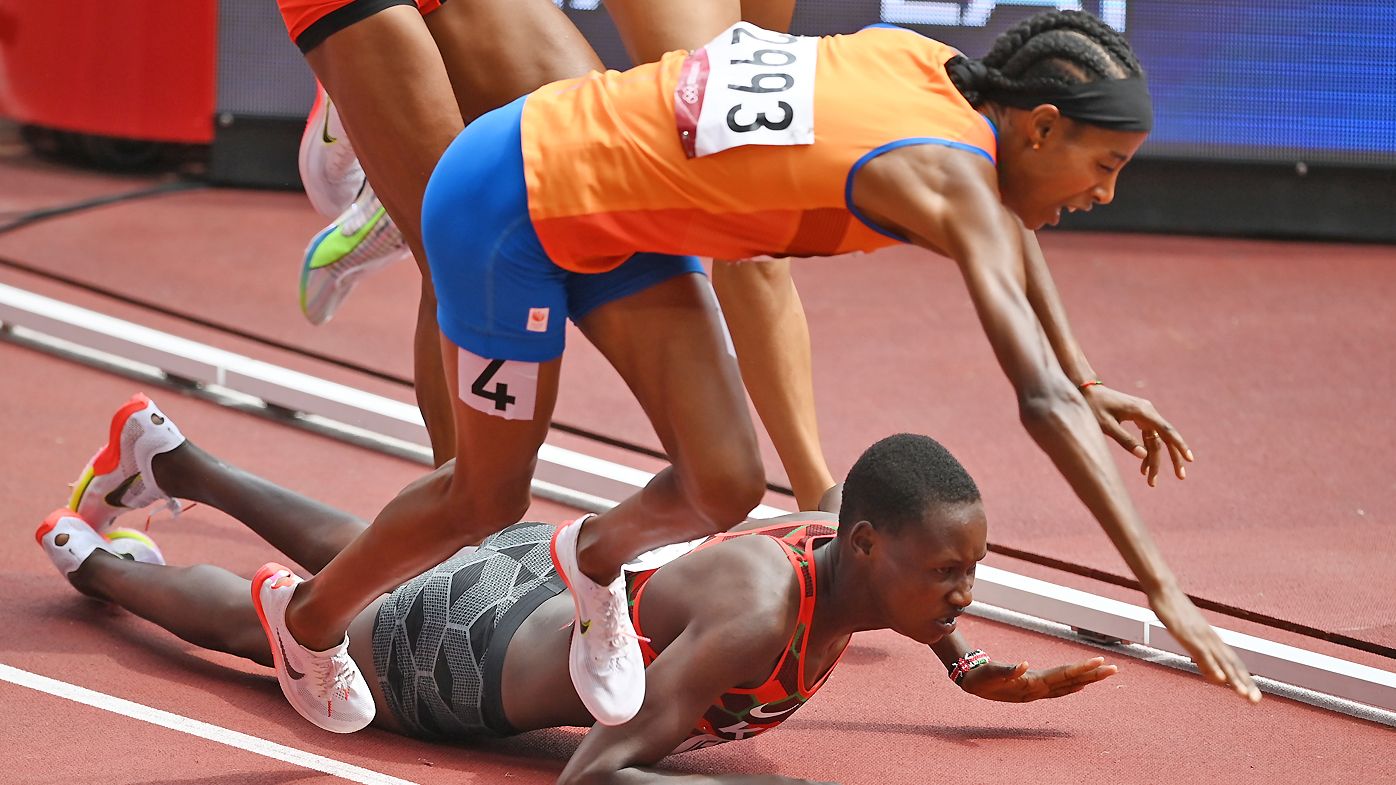 Sifan Hassan of Team Netherlands and Edinah Jebitok of Team Kenya trip and fall during round one of the Women&#x27;s 1500m heats