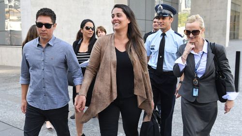 The brother of Fabiana Palhares, Raphael Palhares (left), leaves the Supreme Court with supporters following the sentencing. Picture: AAP