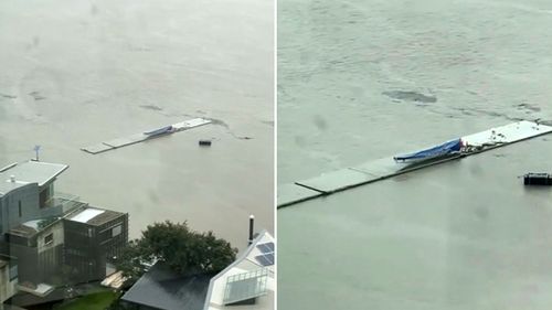 Queensland Police said a large chunk of a concrete pier, estimated to be around 40 meters long, came loose as the area was inundated with heavy rain.