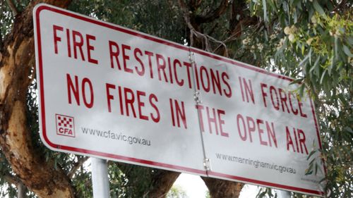 Woman arrested over Victorian grass fire