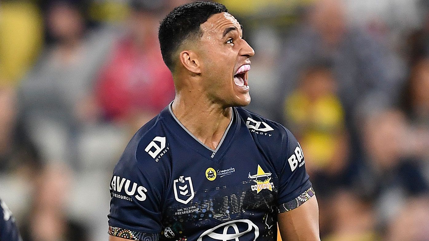 Valentine Holmes of the Cowboys celebrates after kicking the winning field goal during the round 12 NRL match between the North Queensland Cowboys and the New Zealand Warriors at QCB Stadium, on May 28, 2021, in Townsville, Australia. (Photo by Ian Hitchcock/Getty Images)