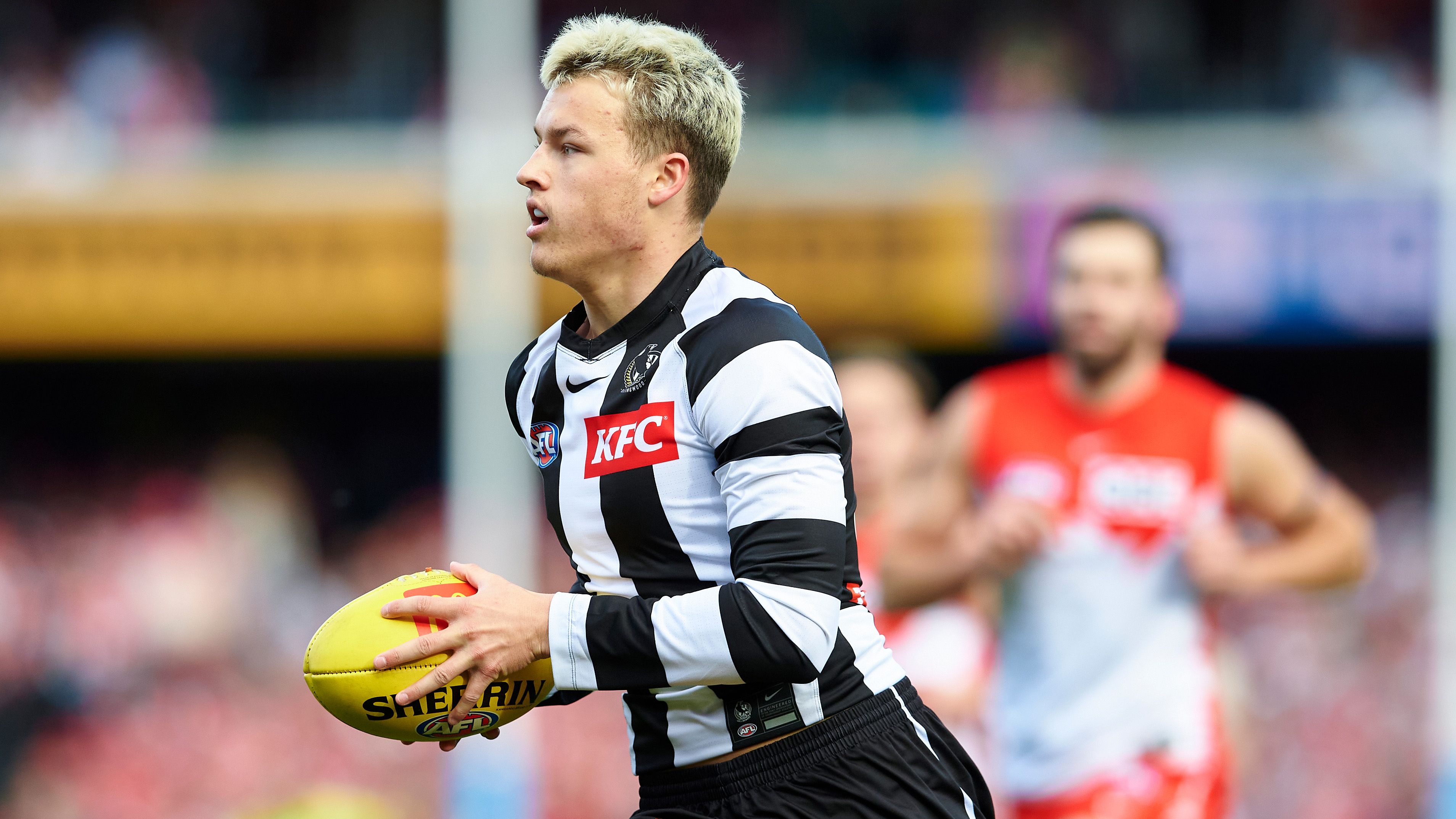 Jack Ginnivan of the Magpies controls the ball during the round 22 AFL match between the Sydney Swans and the Collingwood Magpies at Sydney Cricket Ground on August 14, 2022 in Sydney, Australia. (Photo by Brett Hemmings/AFL Photos/via Getty Images )