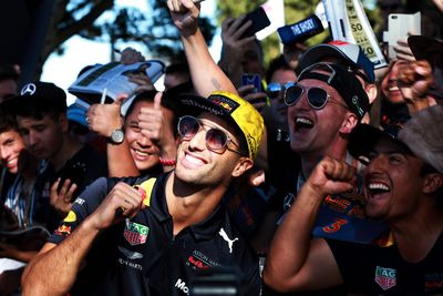 <p>Ricciardo takes a selfie with fans outside Albert Park on the Friday of the Grand Prix. (AAP)</p>