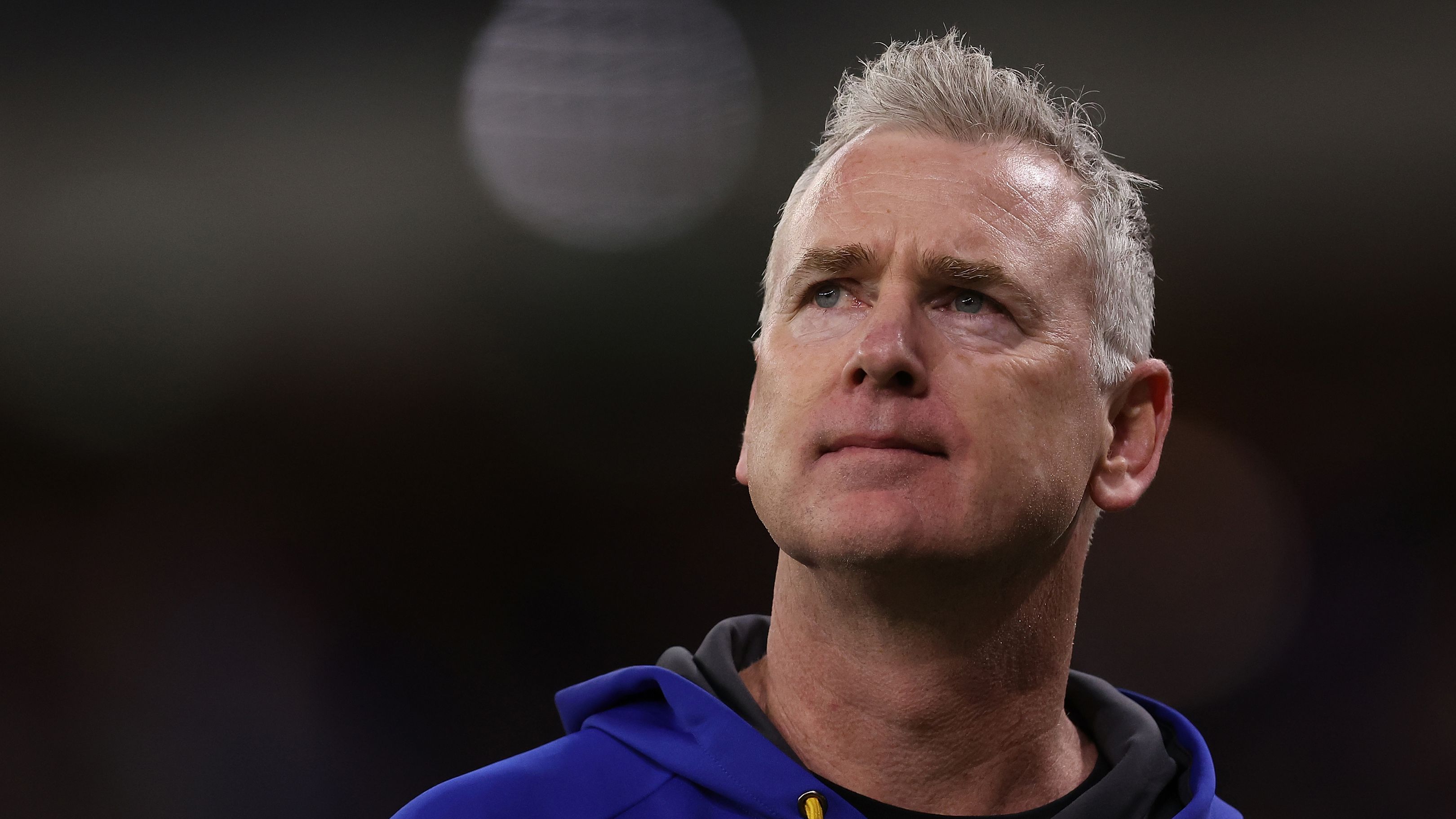 PERTH, AUSTRALIA - AUGUST 12: Adam Simpson, head coach of the Eagles looks to the scoreboard while walking to the rooms at the half time break during the round 22 AFL match between West Coast Eagles and Fremantle Dockers at Optus Stadium, on August 12, 2023, in Perth, Australia. (Photo by Paul Kane/Getty Images)