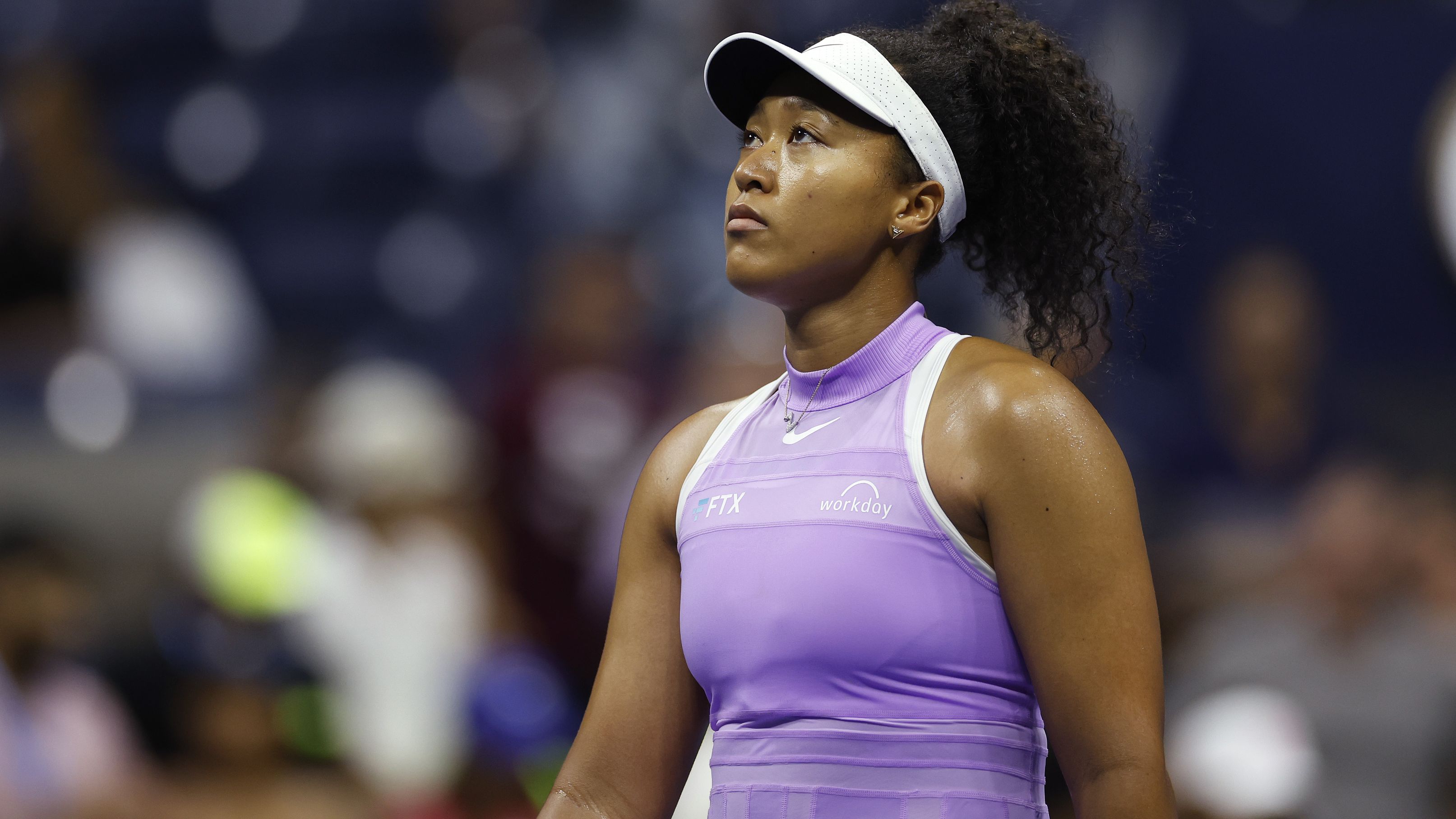 Naomi Osaka of Japan reacts during the second set against Danielle Collins of the United States.