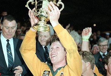 Who coached the Wallabies to win their first Rugby World Cup in 1991?