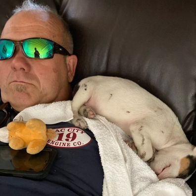 Firefighter adopts baby Pitbull he saved