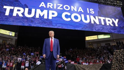 Republican presidential nominee former President Donald Trump arrives at a campaign rally in Arizona