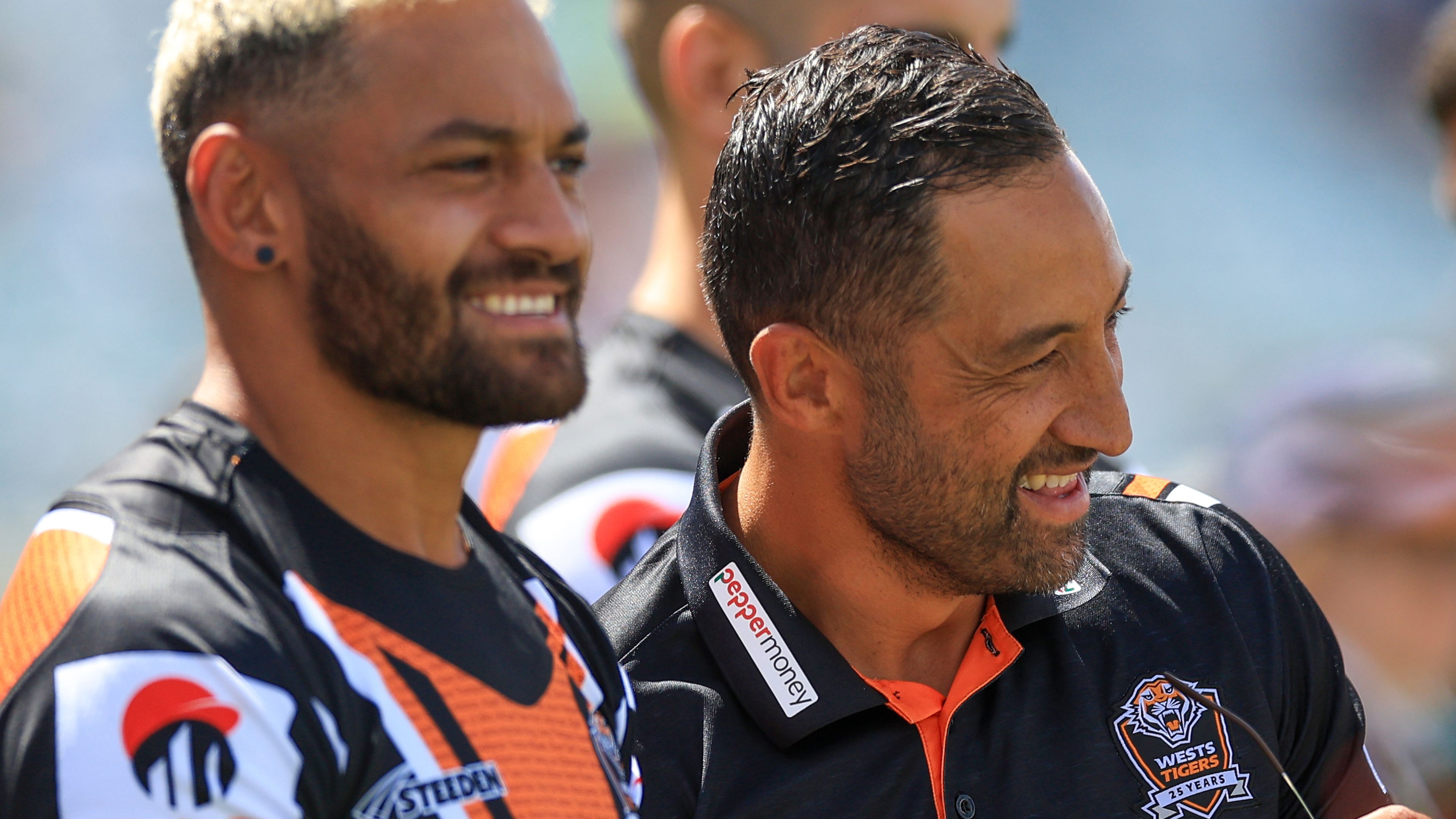 Tigers hooker Api Koroisau with head coach Benji Marshall.