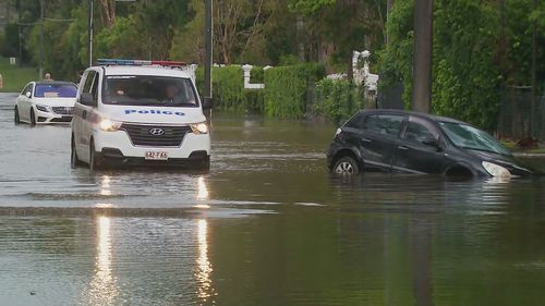 Parts of Queensland's south-east have been swamped after torrential rain ﻿which stranded multiple people in their cars in floodwaters.