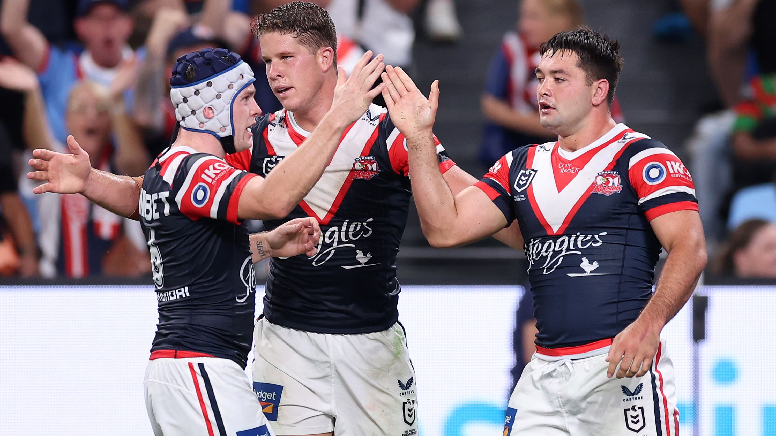 SYDNEY, AUSTRALIA - MARCH 17:  Brandon Smith of the Roosters celebrates with team mates after scoring a try during the round three NRL match between Sydney Roosters and South Sydney Rabbitohs at Allianz Stadium on March 17, 2023 in Sydney, Australia. (Photo by Mark Kolbe/Getty Images)
