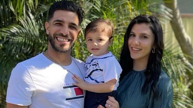 Billy Dib with his wife Berry, with their son Laith.