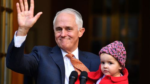 Malcolm Turnbull with members of his family as he speaks to the media during his last press conference at Parliament House in Canberra as Prime Minister. (AAP)