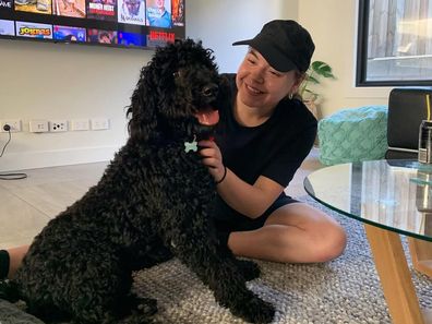 Caitlin Magagna with her pet dog.