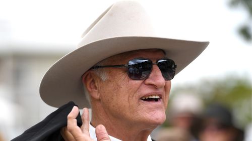 Australian Party leader Bob Katter has joked about a proposal to ban relationships between politicians and their employees, saying, "I need protection" (AAP).