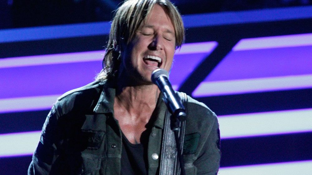 Keith Urban is to headline the grand final. (AAP)