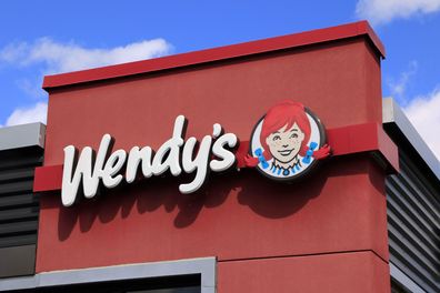 Wendy's hamburger business logo on store front, northern Idaho. 