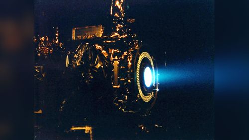 An example of an ion propulsion system during a hot fire test. (NASA/JPL)