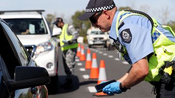 Police stopping drivers at checkpoints