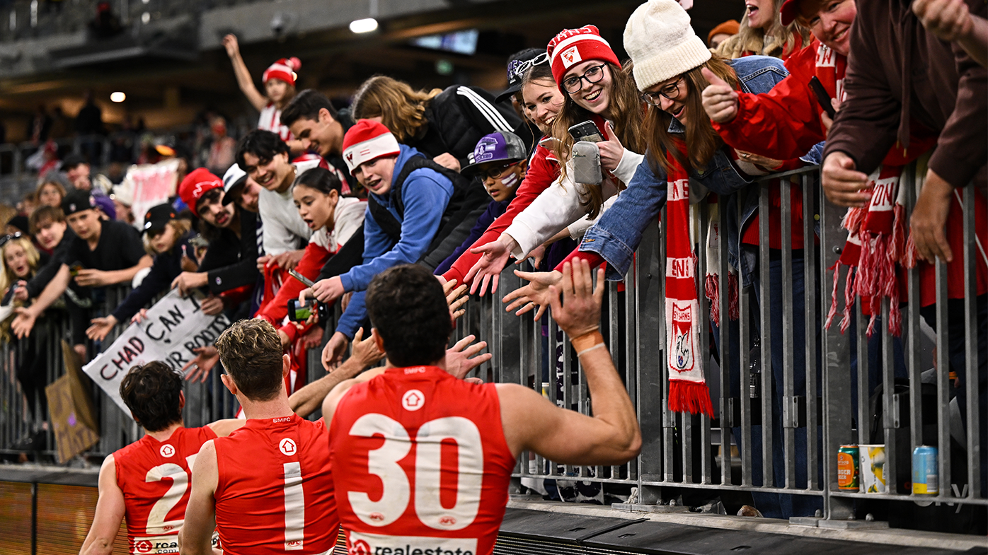 Sydney fans celebrate a win over Fremantle round 19. 