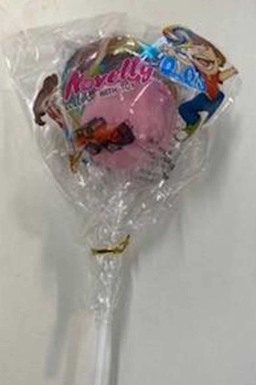 The lollipops are packaged with the spinning top toy.