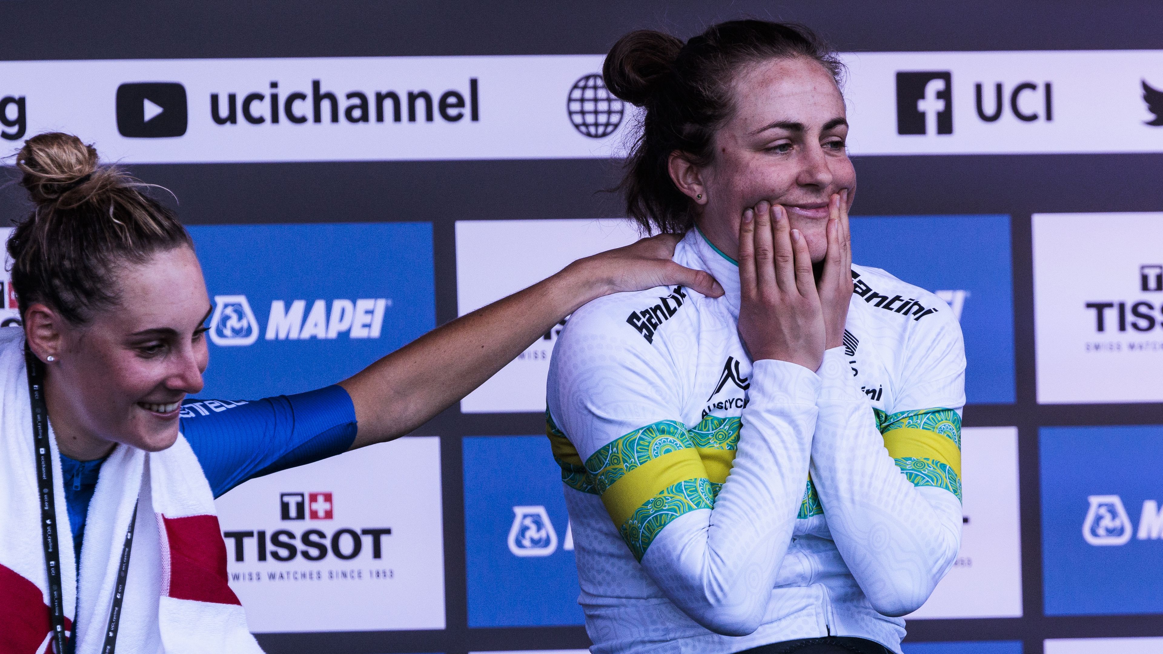 Australian rider Grace Brown waits nervously as Dutch cyclist Ellen van Dijk pips her for gold.