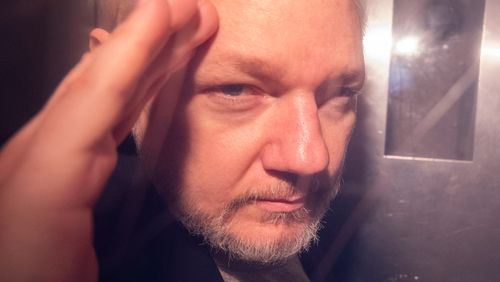 The US government is seeking to extradite Julian Assange over the publication of damaging military documents.