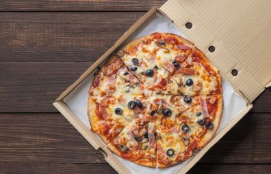 Pizza in takeaway box generic stock image