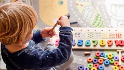 Preschool childcare centre toddler playing early education learning children