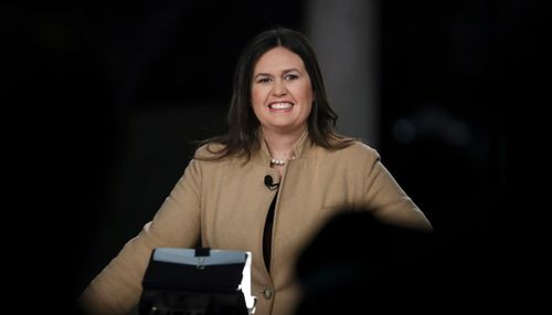 "At this point, we're moving forward," Trump spokeswoman Sarah Huckabee Sanders said, even as officials continued to work on a backup plan to have the president speak somewhere else.