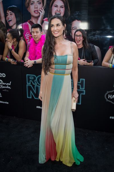 <p>The top actress of the nineties Demi Moore is returning to the screen with a supporting role in the comedy Rough Night but she managed to steal top honours at the film's New York premiere.<br>
<br>
In a rainbow-striped <a href="http://style.nine.com.au/2017/04/26/10/20/christian-dior-deal-billion-arnault-lvmh" target="_blank">Christian Dior</a> gown the 54-year-old star of <em>Ghost </em>and <em>St Elmo's Fire</em> managed to outshine the film's top-billed actresses Scarlett Johanssen, &nbsp;Ilana Glazer, Kate McKinnon, Zoe Kravitz, Jillian Bell and Lucia Aniello.<br>
<br>
Also making a red carpet return was <em>Sixteen Candles</em>&nbsp;actress Molly Ringwald, posing in sunglasses and a cheery sun dress.<br>
<br>
While Ilana Glazer turned heads in her unexpectedly sexy Lanvin suit and Zoe was red hot in Oscar de la Renta, Demi took out top honours.</p>
<p><br>
<br>
</p>