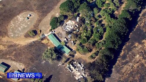 A family is grateful to be alive after they were forced to huddle together inside a shipping container as flames tore through their home.Isabel Bafunno, 81, said they tried to put out the fire when it reached their remote Caveat property in Victoria, but "it was hopeless".