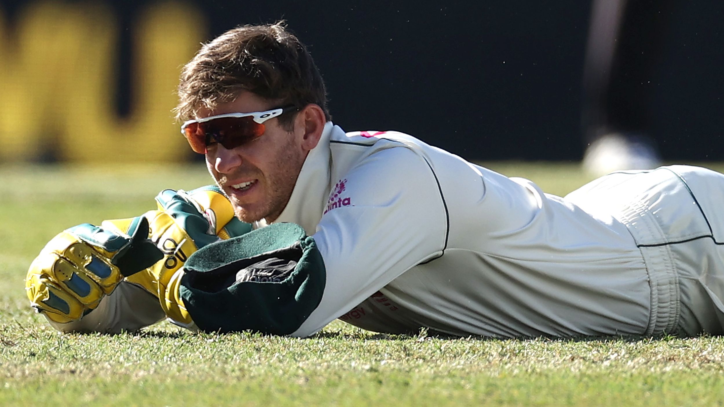 Tim Paine of Australia reacts after dropping a catch off Hanuma Vihari of India.