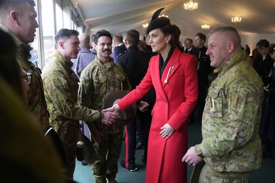 Kate, Princess of Wales shakes hands with troops from the 5th Royal Australian Regiment (5RAR) after a St David's Day parade with members of the 1st Battalion, The Welsh Guards in Windsor England, Wednesday, March 1, 2023