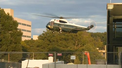 Marine One lands at Walter Reed National Military Medical Center to fly US President Donald Trump back to the White House