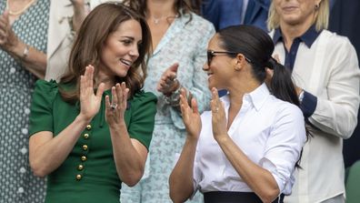 Kate and Meghan engagement at Wimbledon engagement rings visible