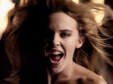 Kylie Minogue in 'Better the Devil You Know' music video (Mushroom)