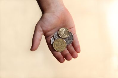 Child holding money