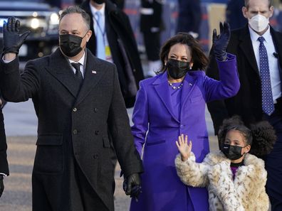 Vice President Kamala Harris, and her husband Doug Emhoff, and family, walk in front of the White House during a Presidential Escort to the White House, Wednesday, Jan. 20, 2021 in Washington, after being sworn in as the 46th vice president of the United States. (AP Photo/Jacquelyn Martin)