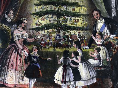  Queen Victoria and Prince Albert around the Christmas tree