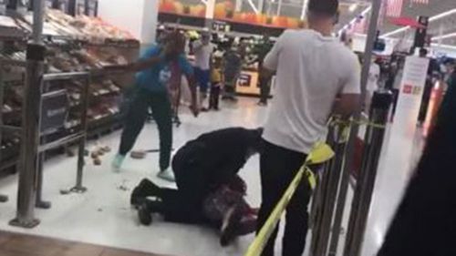 An Alabama police officer slams a woman to the ground in a supermarket.